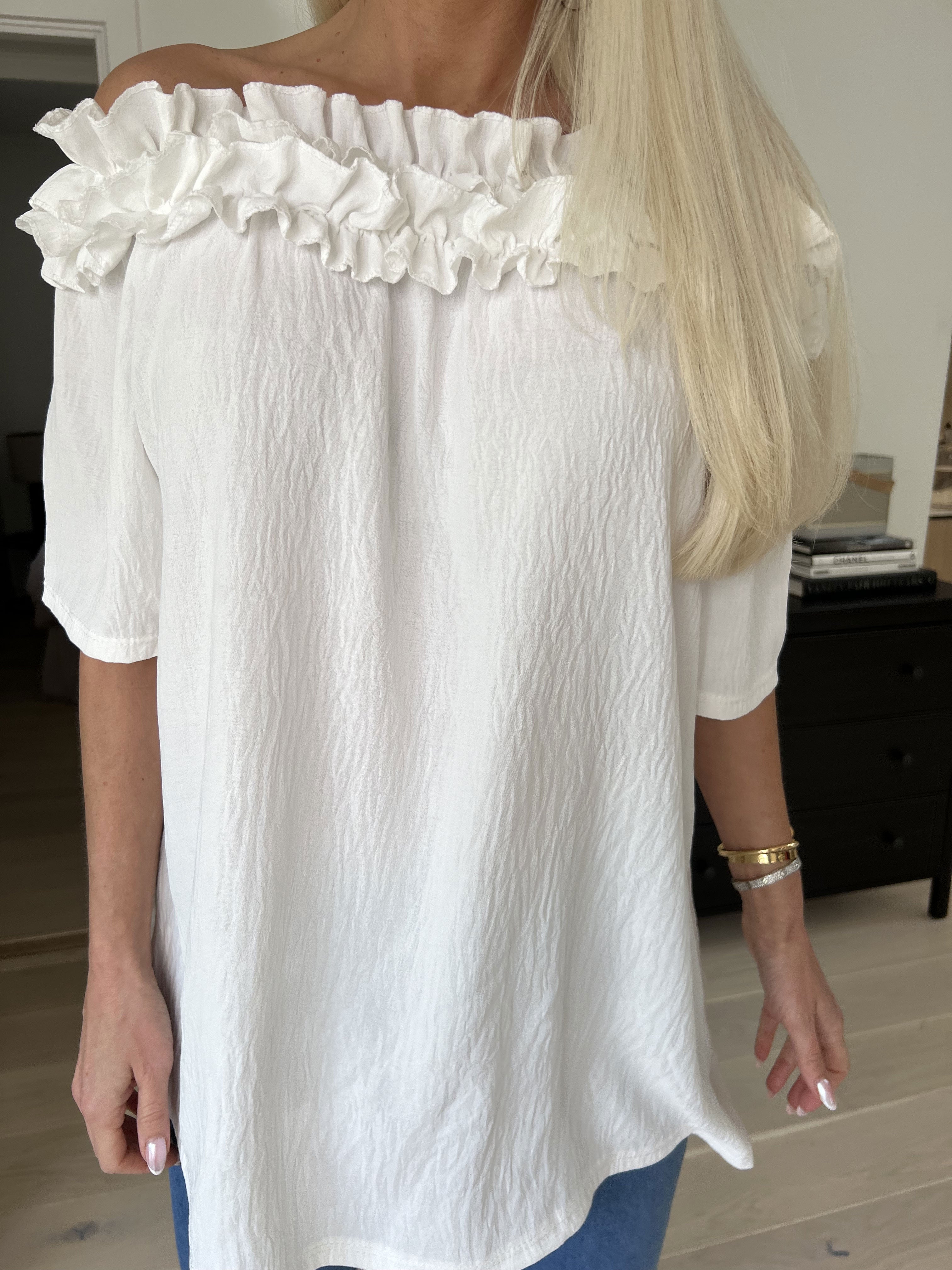 Chili Sleeveless - Finaste tunika med resår och volang i halsen